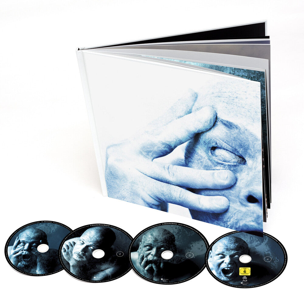 the album cover for Porcupine Tree - In Absentia (W/Book) [Deluxe] (Uk)