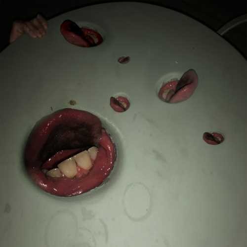 the album cover for Death Grips - Year Of The Snitch
