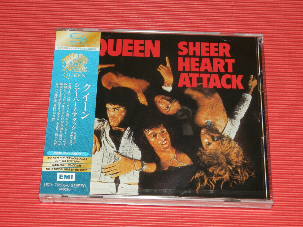 the album cover for Queen - Sheer Heart Attack [Deluxe] [Remastered] [Reissue] (Shm) (Jpn)