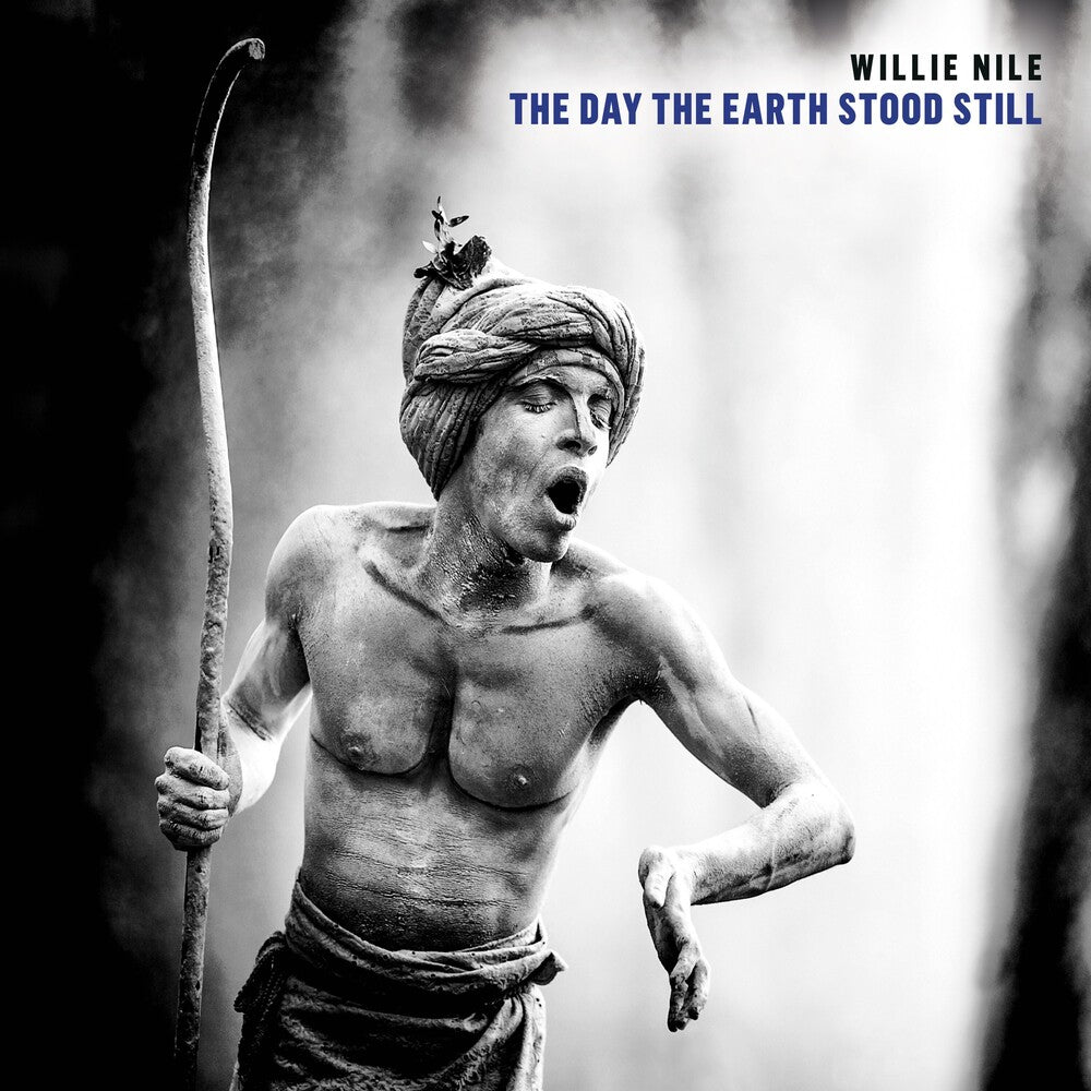 the album cover for Willie Nile - The Day The Earth Stood Still