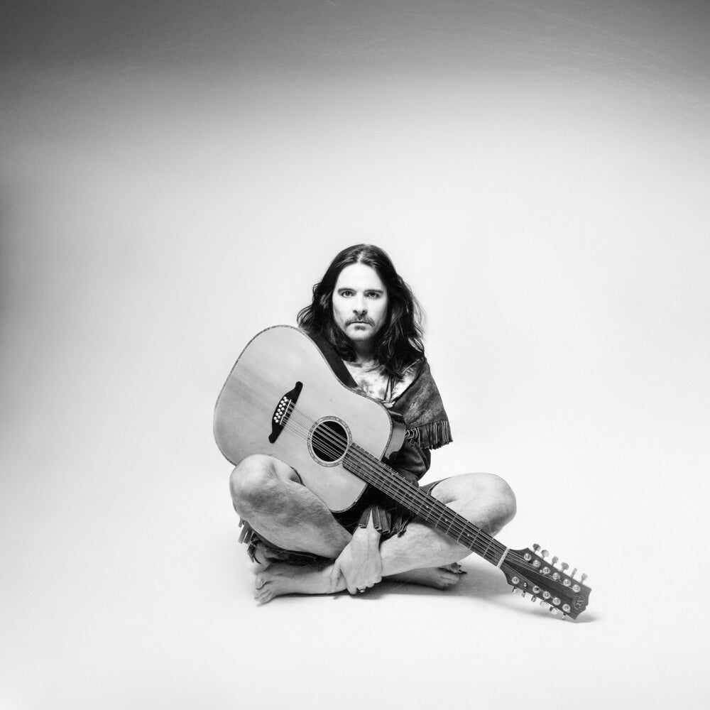 the album cover for Barrie-James - Strange Desire