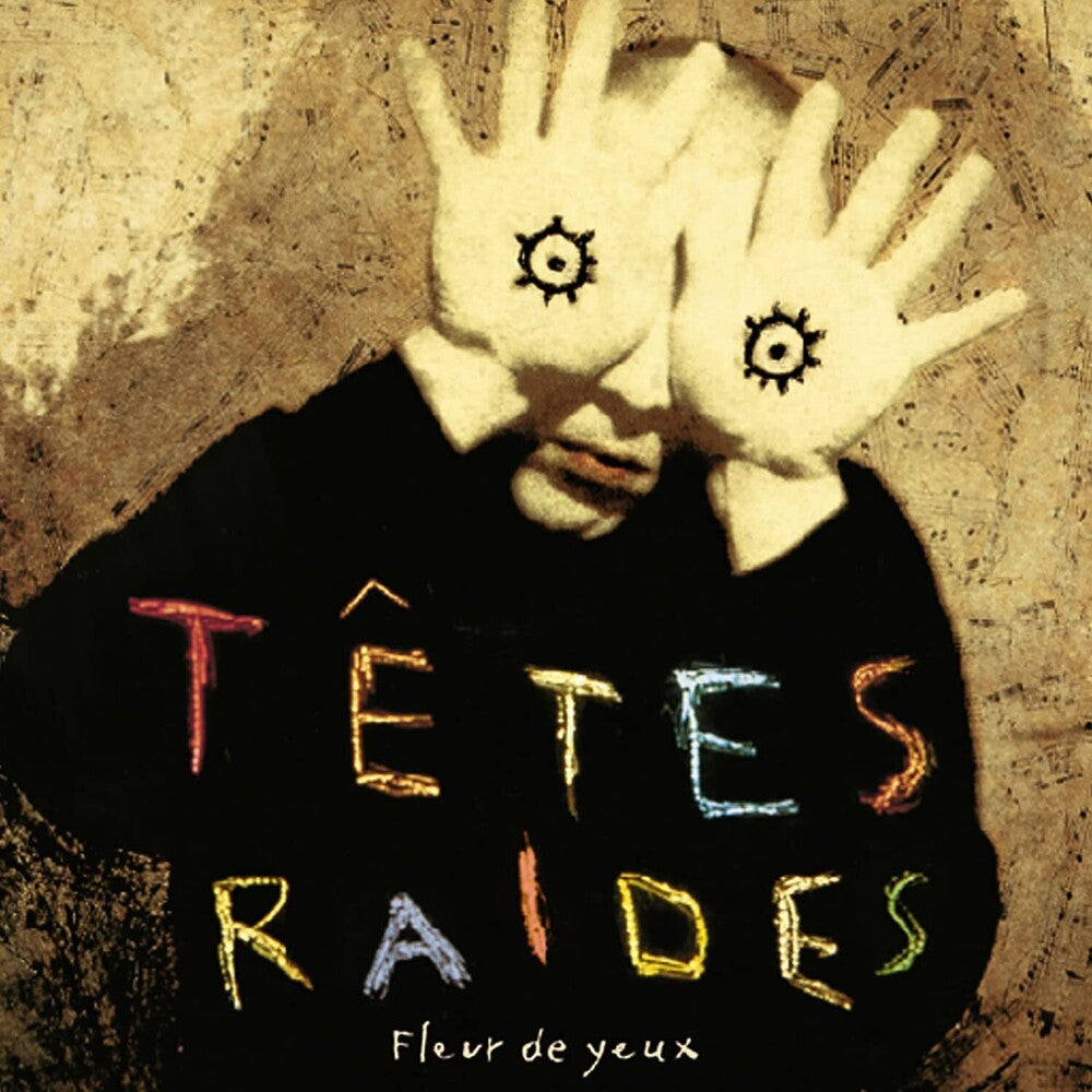 the album cover for Tetes Raides - Fleur De Yeux (Fra)