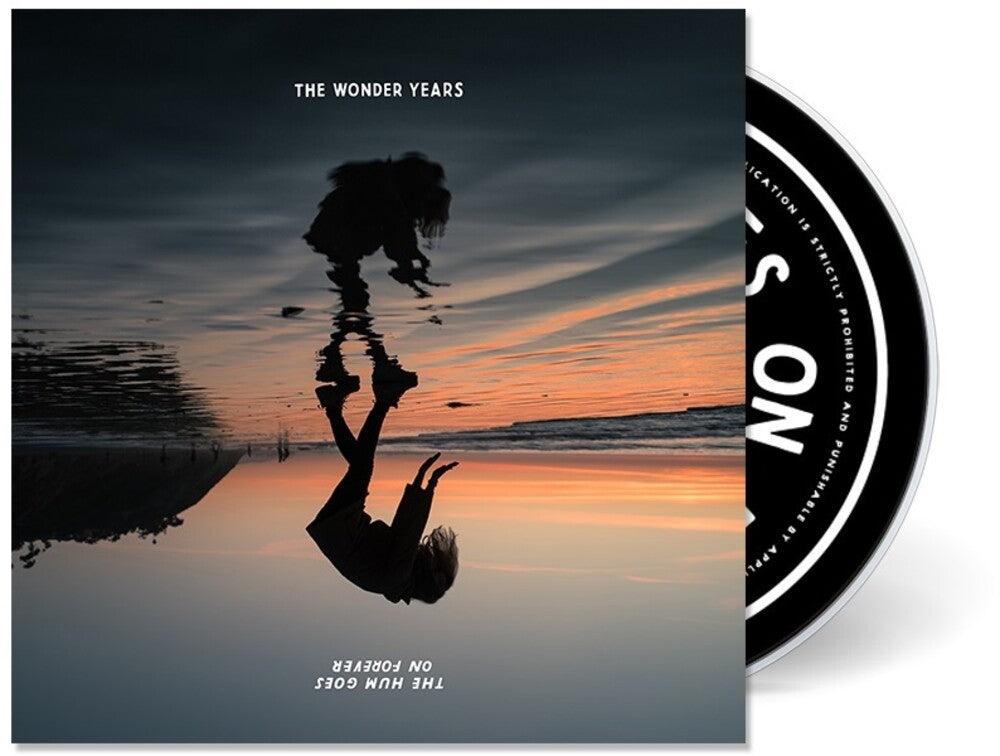 the album cover for The Wonder Years - The Hum Goes On Forever