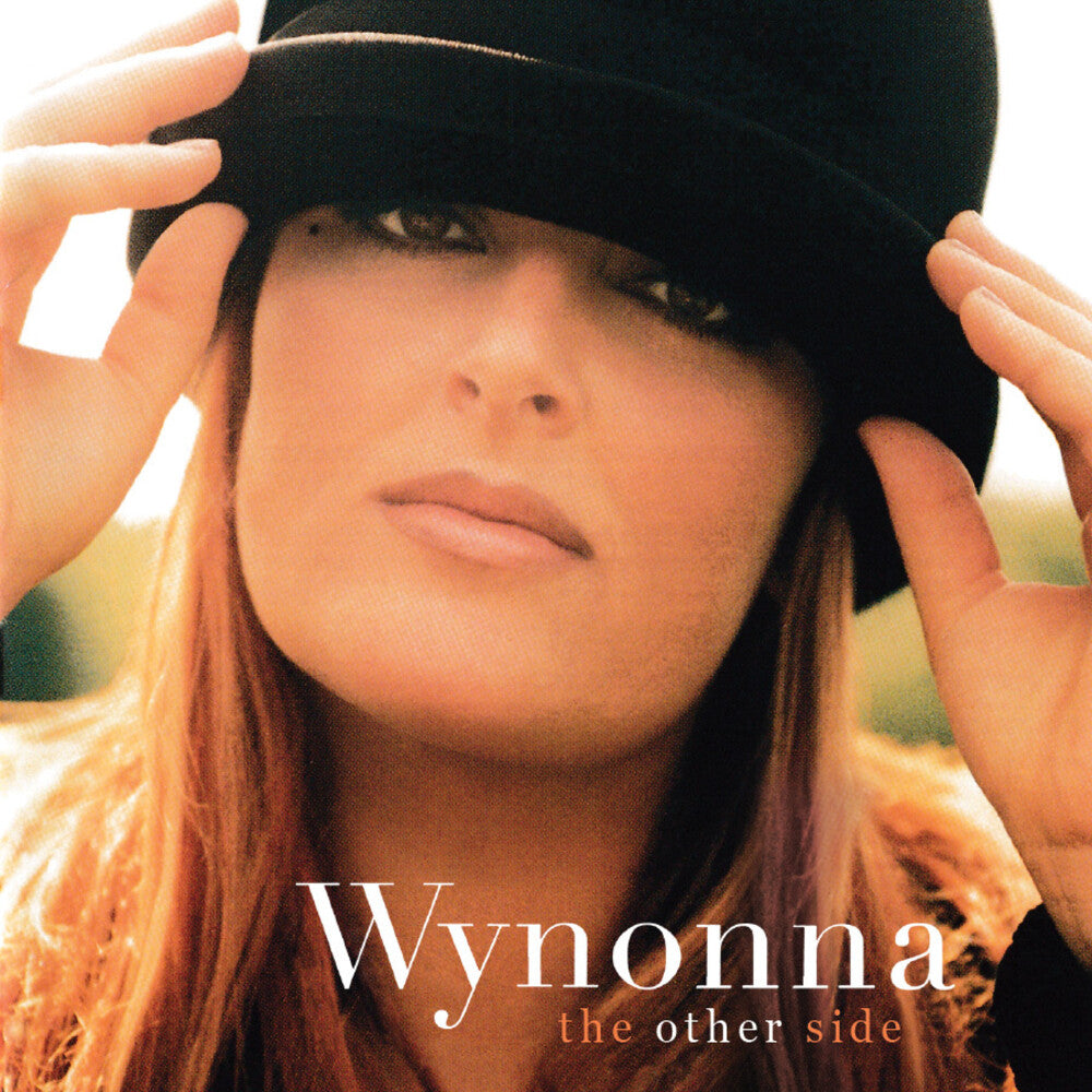 the album cover for Wynonna Judd - The Other Side