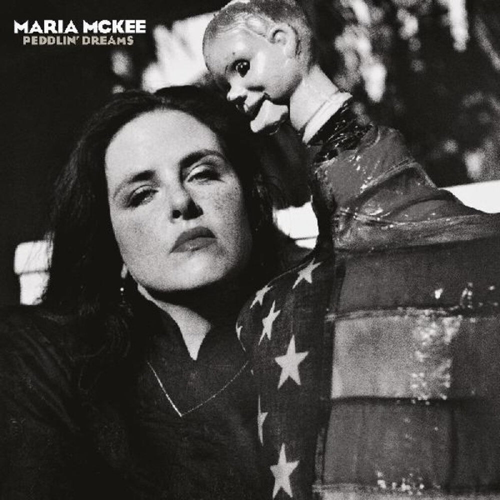 the album cover for Maria Mckee - Peddlin Dreams (Post) [With Booklet]