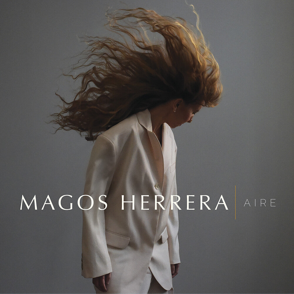 the album cover for Magos Herrera - Aire