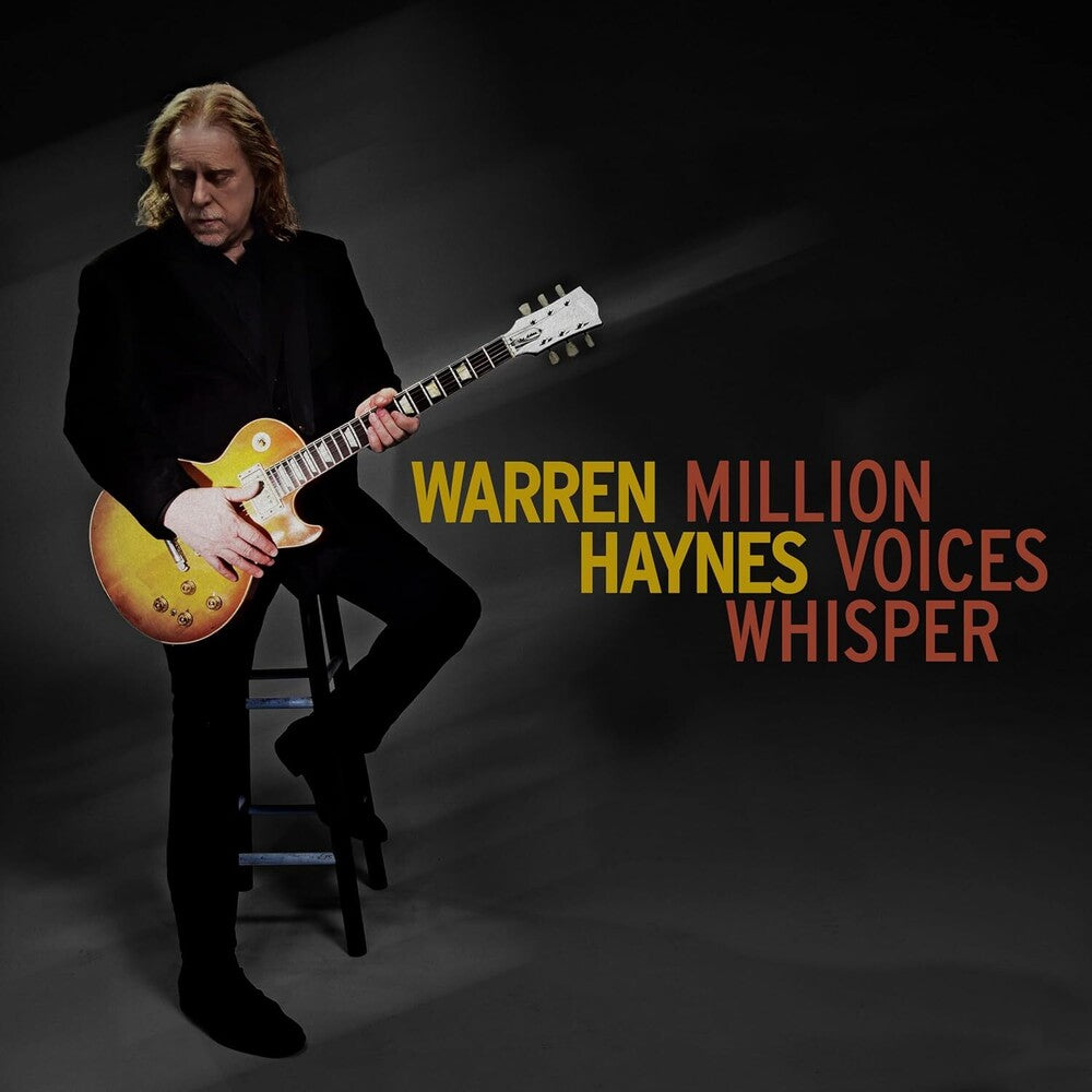 the album cover for Warren Haynes - Million Voices Whisper [CD]
