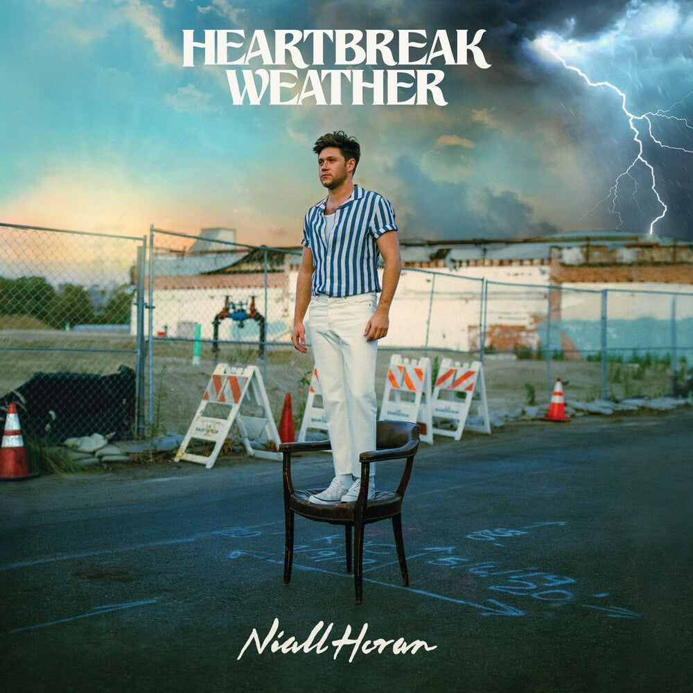 the album cover for Niall Horan - Heartbreak Weather