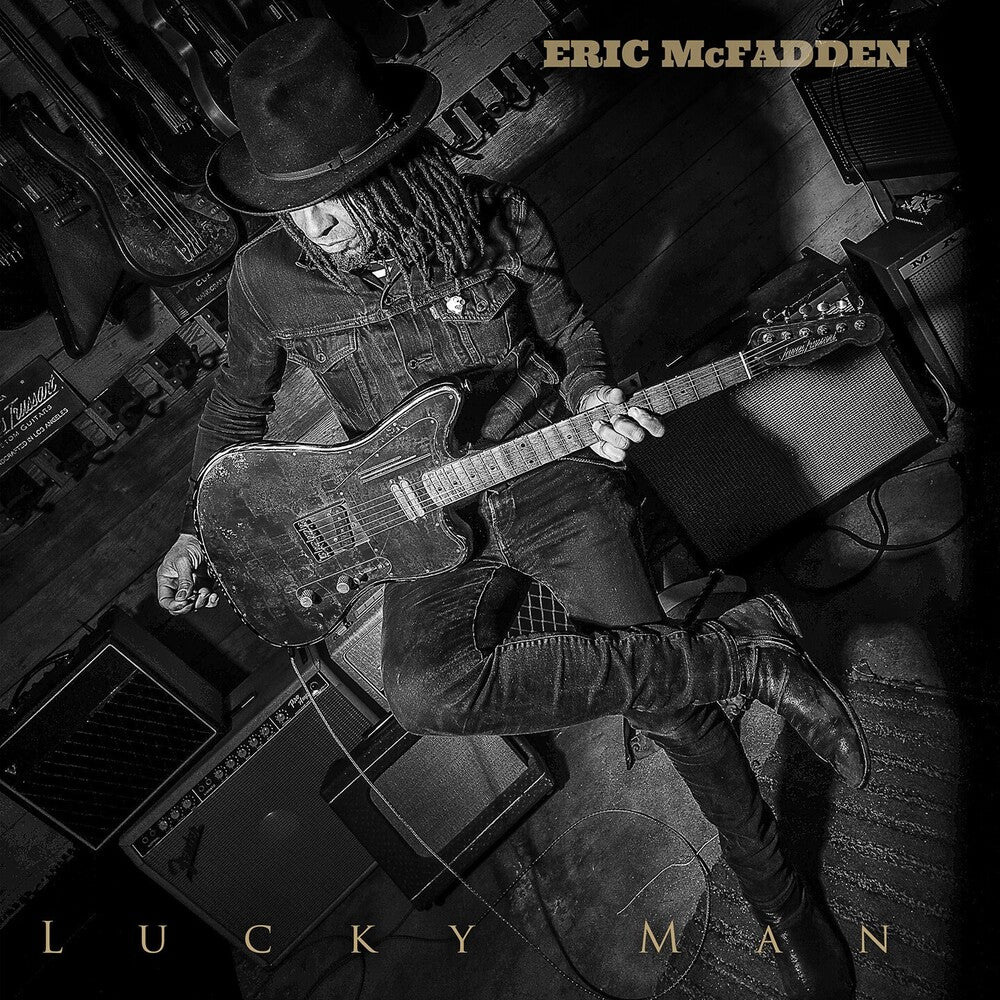 the album cover for McFadden, Eric - Lucky Man
