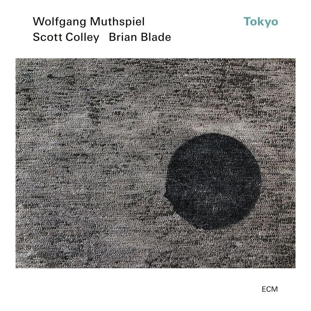 the album cover for Wolfgang Muthspiel  / Scott Colley / Brian Blade - Tokyo