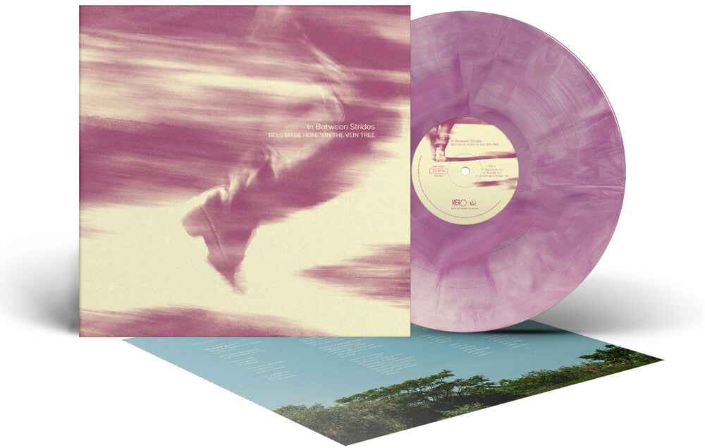 Pre-Order: In Between Strides [Colored Vinyl] (Ofgv) Vinyl Record