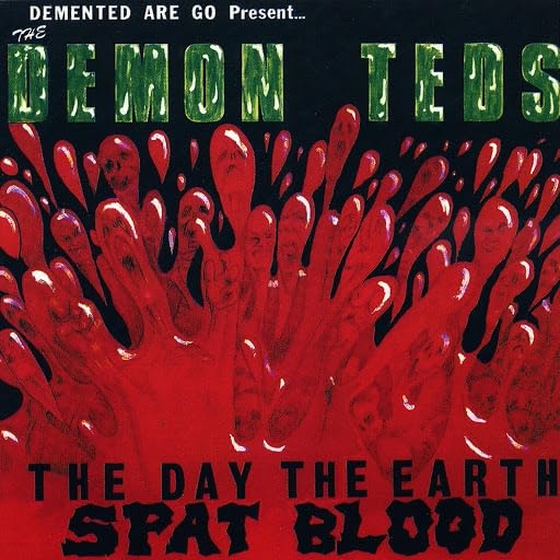 Demented Are Go - Day The Earth Spat Blood [Clear Vinyl] (Grn) (Red) (Spla) Vinyl Record Album Cover
