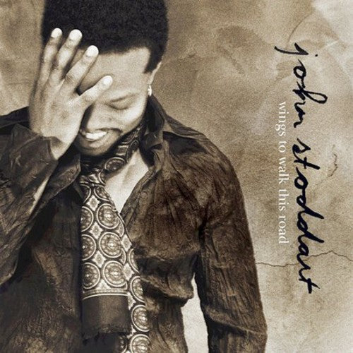 the album cover for John Stoddart - Wings to Walk This Road