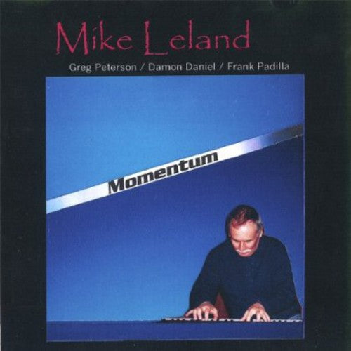 the album cover for Mike Leland - Momentum