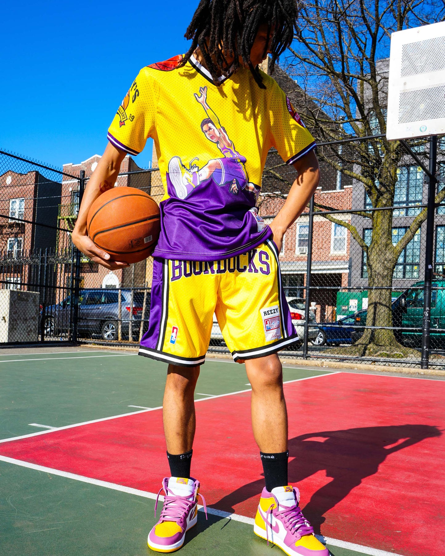 The Boondocks - Air Riley Mesh Knit Yellow & Purple Mens T Shirt