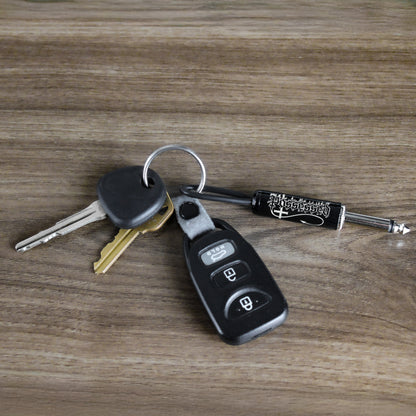 Possessed Logo Guitar Plug Keychain