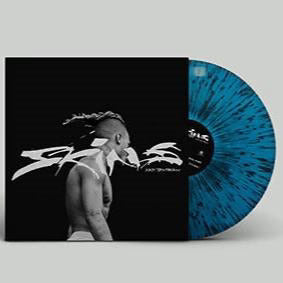 Skins (TRANSLUCENT BLUE + BLACK SPLATTER VINYL) Vinyl Record