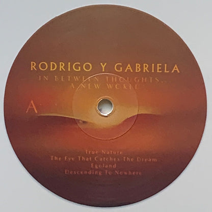 Rodrigo Y Gabriela – In Between Thoughts…A New World (LP Vinyl) Vinyl Record