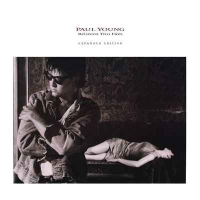 Paul Young - Between Two Fires (180G) [Flame Red Vinyl] [2LP] [Vinyl] Vinyl Record